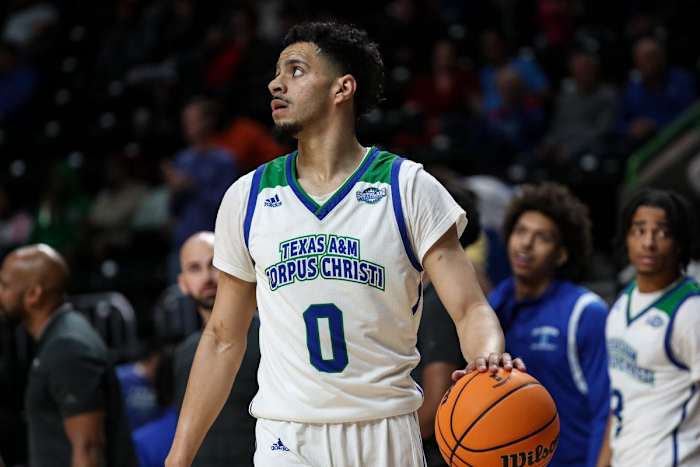 Islanders' Trevian Tennyson dribbles and watches the clock run out at the end of the game at the American Bank Center on Saturday, Jan. 28, 2023, in Corpus Christi, Texas.